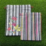 Chintz in strips Drawstring Pouches